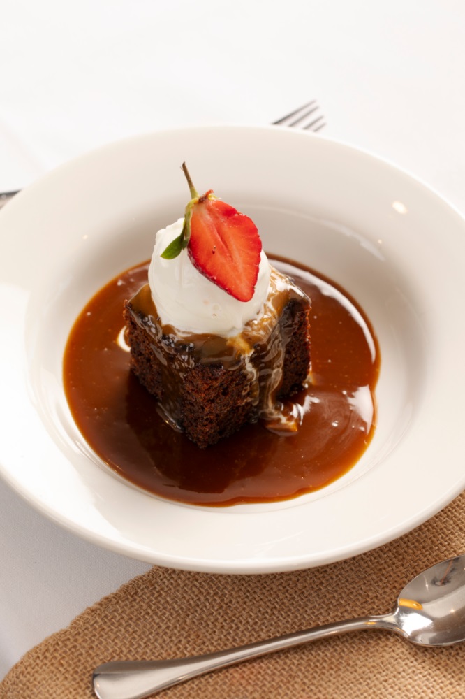 Sticky toffee pudding with cream